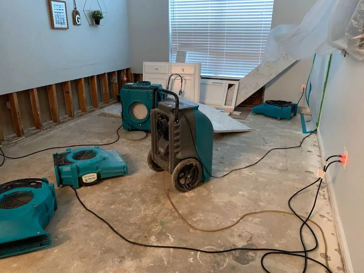 Dehumidifier in flood-cut room for Water Damage Restoration in Shakopee